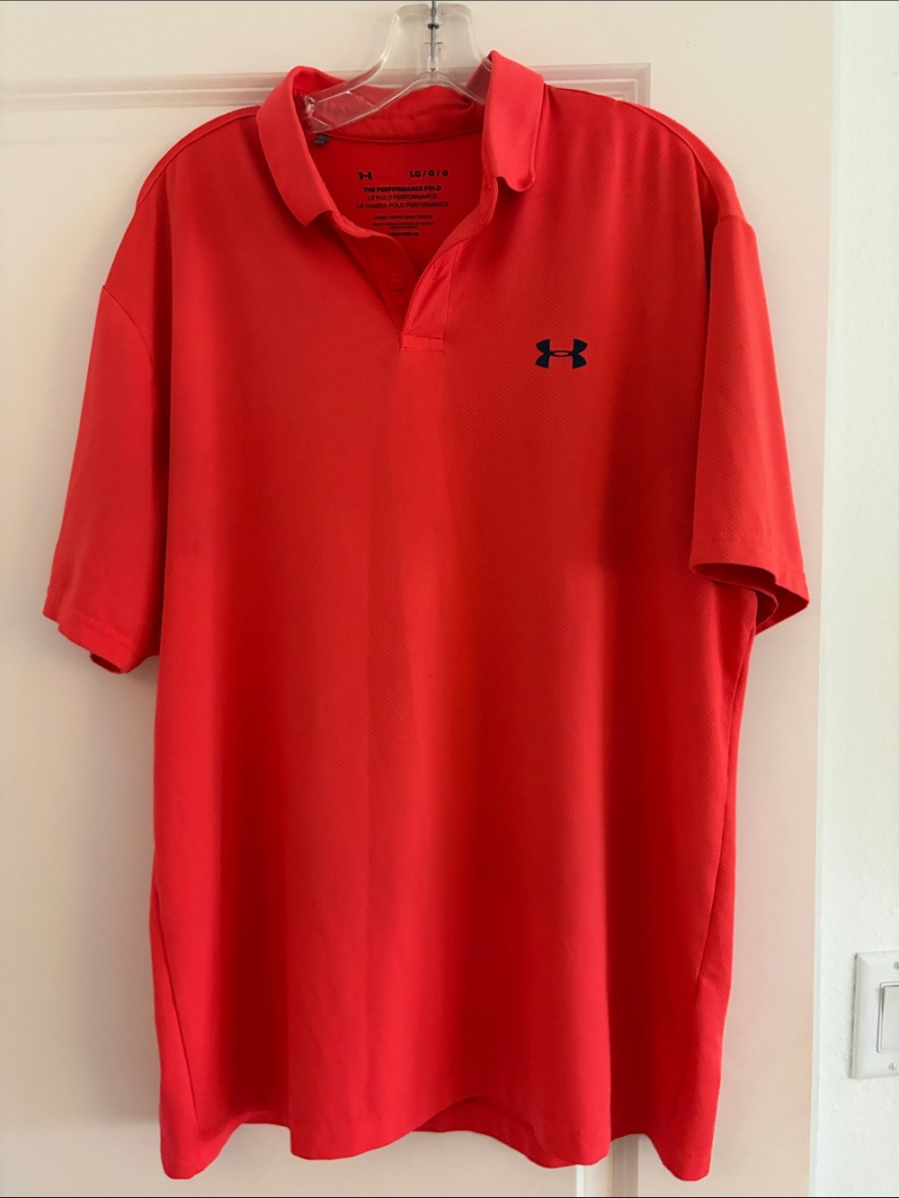 Under Armour Men's Bright orange Polo with Logo